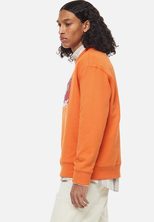 H&M - Relaxed fit printed sweatshirt - orange/connect