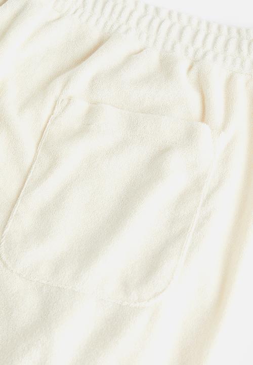 H&M - Regular fit terry joggers - cream