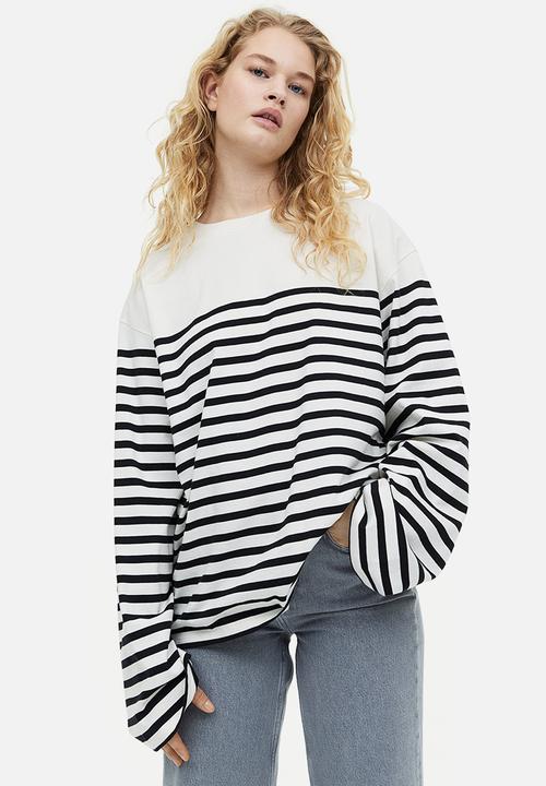 H&M - Long-sleeved jersey top - black / white striped 