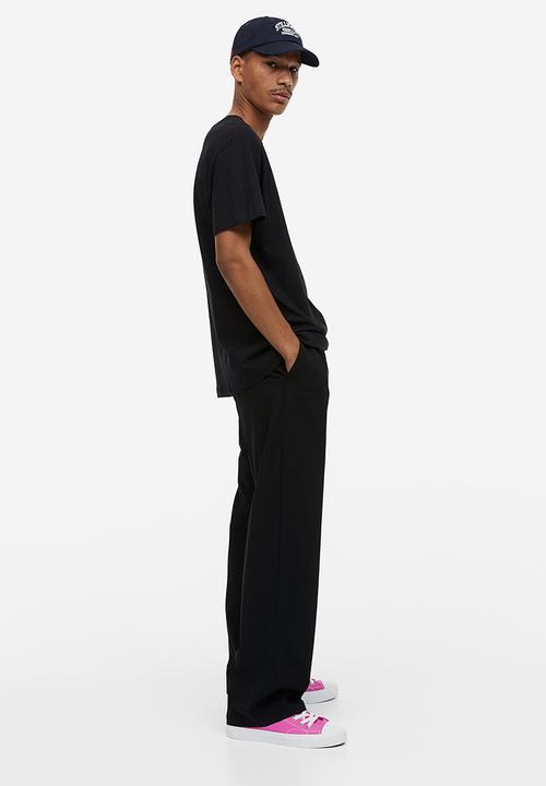 H&M - Regular fit printed T-shirt - black/in all honesty 