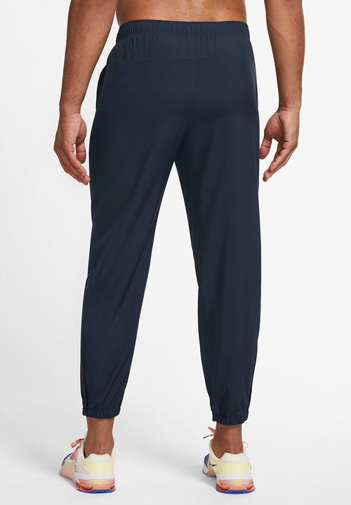 Nike - Dri-FIT Form tapered versatile pants - blue 