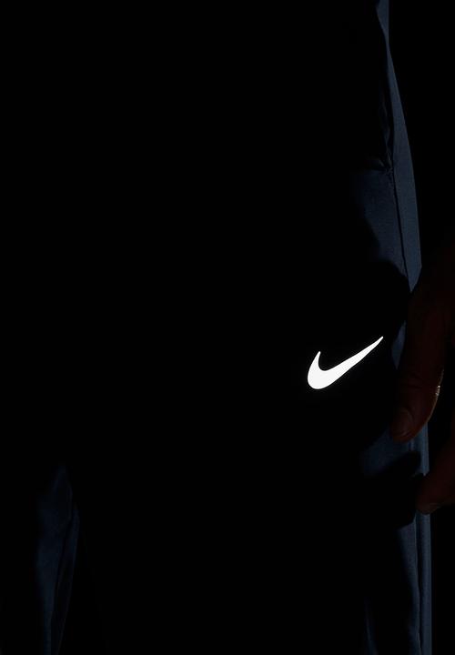 Nike - Dri-FIT Form tapered versatile pants - blue 