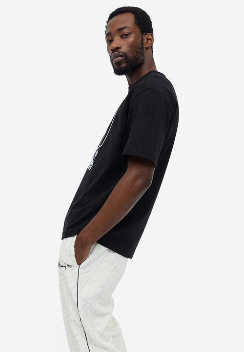 H&M - Relaxed fit printed t-shirt - black/keith haring 