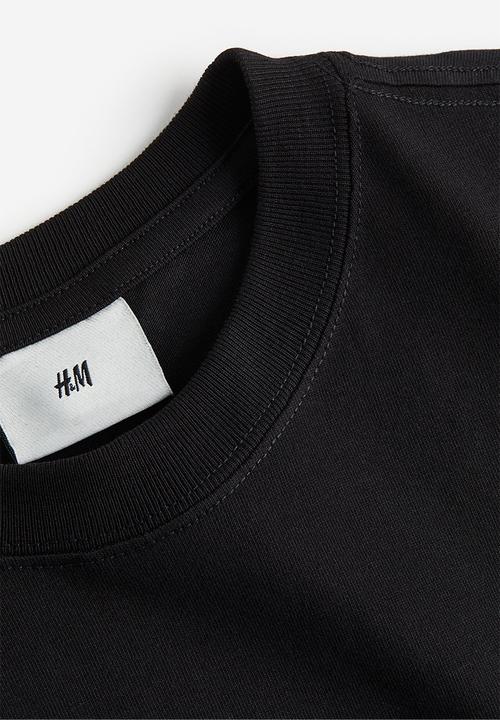 H&M - Relaxed fit printed t-shirt - black/story tellers