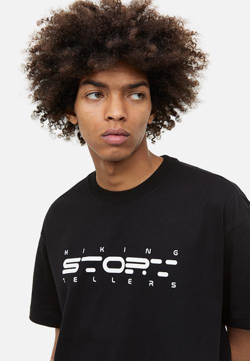 H&M - Relaxed fit printed t-shirt - black/story tellers