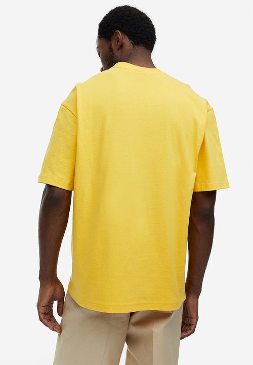 H&M - Relaxed fit printed T-shirt - yellow/keith haring