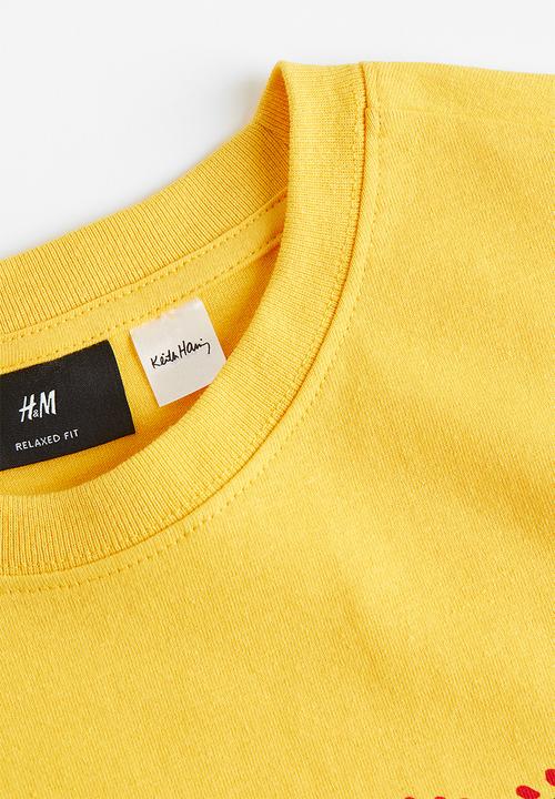 H&M - Relaxed fit printed T-shirt - yellow/keith haring