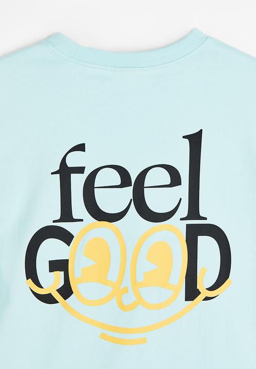 H&M - Relaxed fit printed T-shirt - light turquoise/feel good 