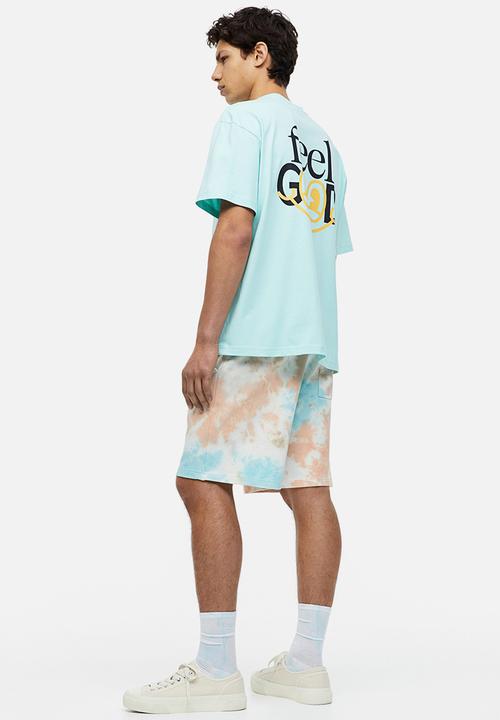 H&M - Relaxed fit printed T-shirt - light turquoise/feel good 