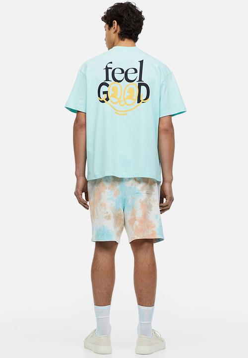 H&M - Relaxed fit printed T-shirt - light turquoise/feel good 