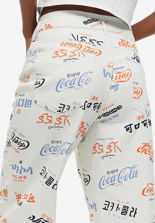 H&M - Printed twill trousers - cream/coca-cola 