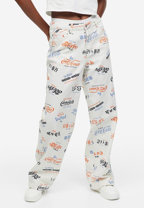 H&M - Printed twill trousers - cream/coca-cola 