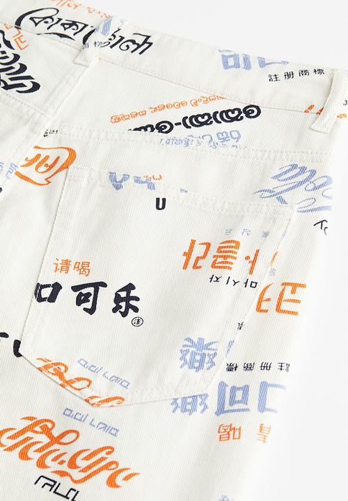 H&M - Printed twill trousers - cream/coca-cola 