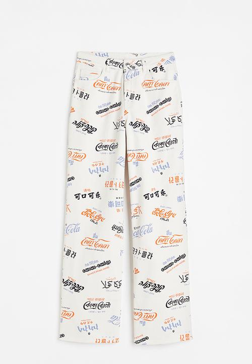H&M - Printed twill trousers - cream/coca-cola 