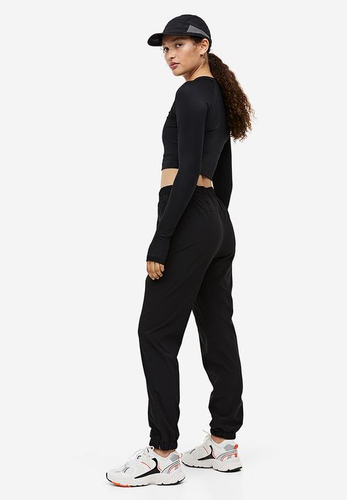 H&M - Drymove™ running trousers - black