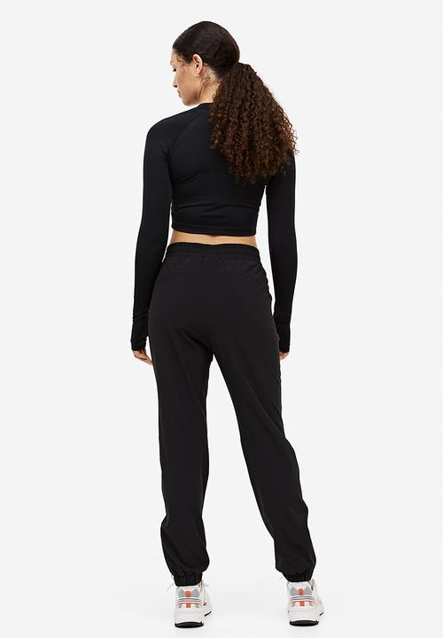 H&M - Drymove™ running trousers - black