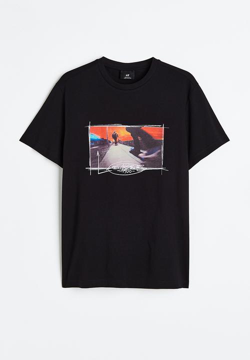 H&M - Regular fit printed T-shirt - black/skaters 