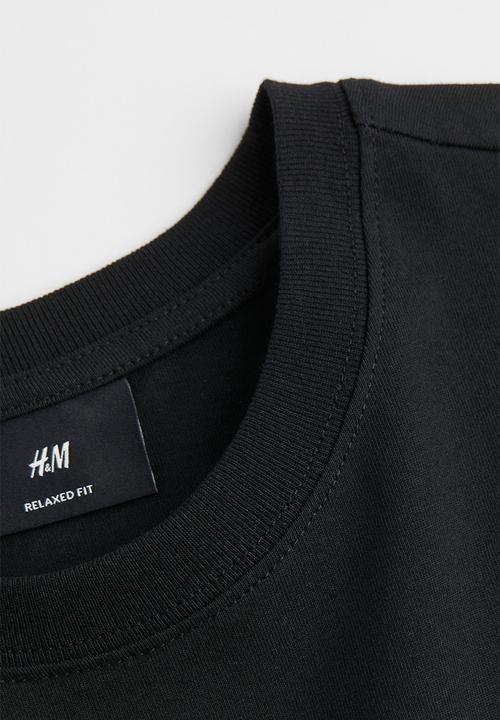H&M - Relaxed fit printed T-shirt - black/sun 