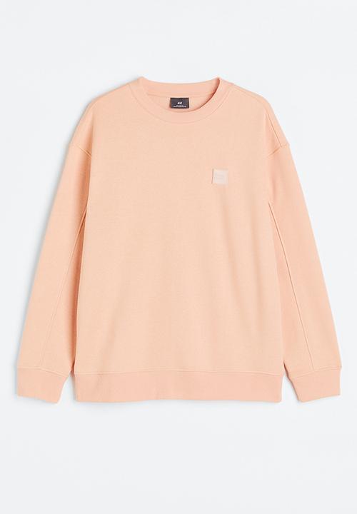 H&M - Relaxed fit appliquéd sweatshirt - apricot 