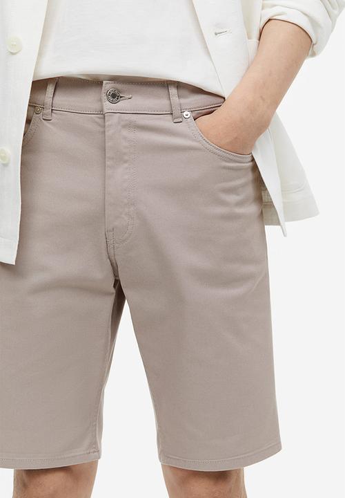 H&M - Slim fit cotton twill shorts - beige 