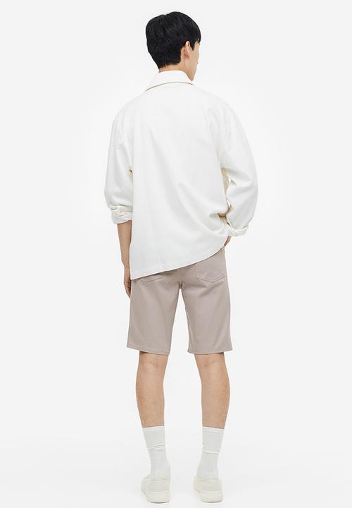 H&M - Slim fit cotton twill shorts - beige 