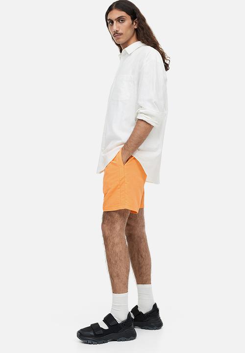 H&M - Regular fit nylon shorts - orange