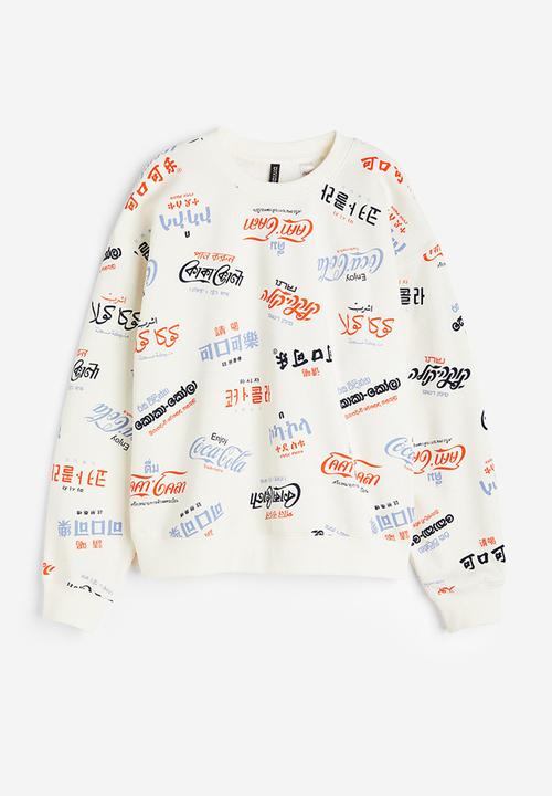 H&M - Printed sweatshirt - cream/coca-cola 