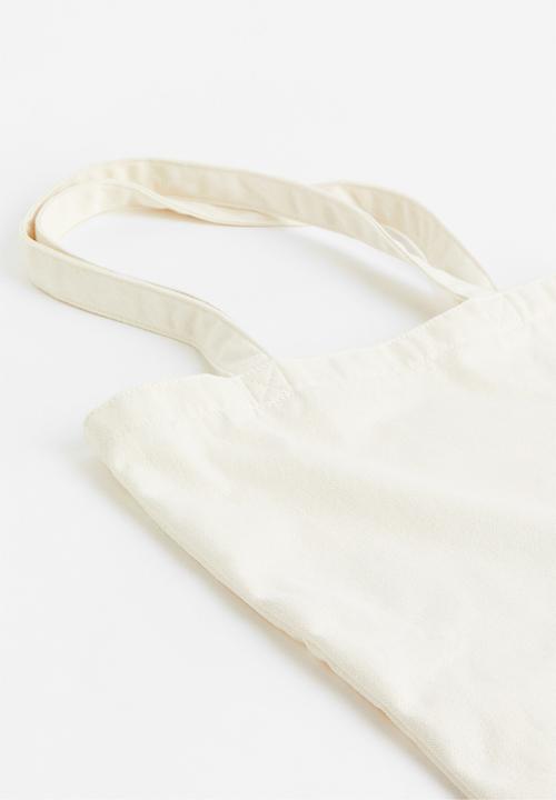 H&M - Printed canvas shopper - cream/fanta 