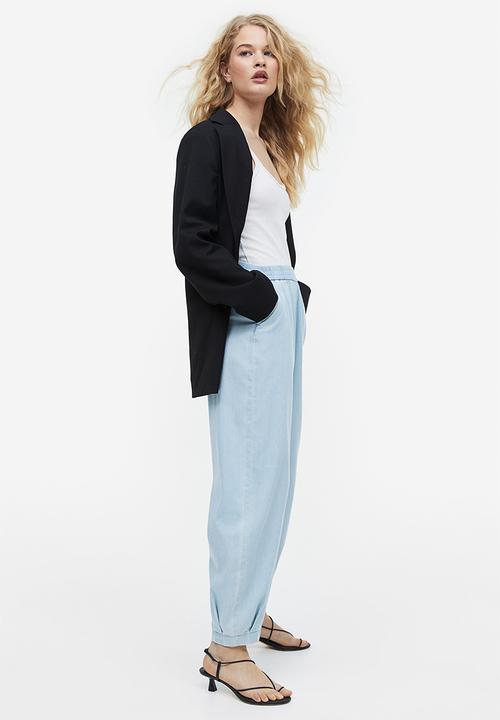 H&M - High-waisted woven joggers - light denim blue 