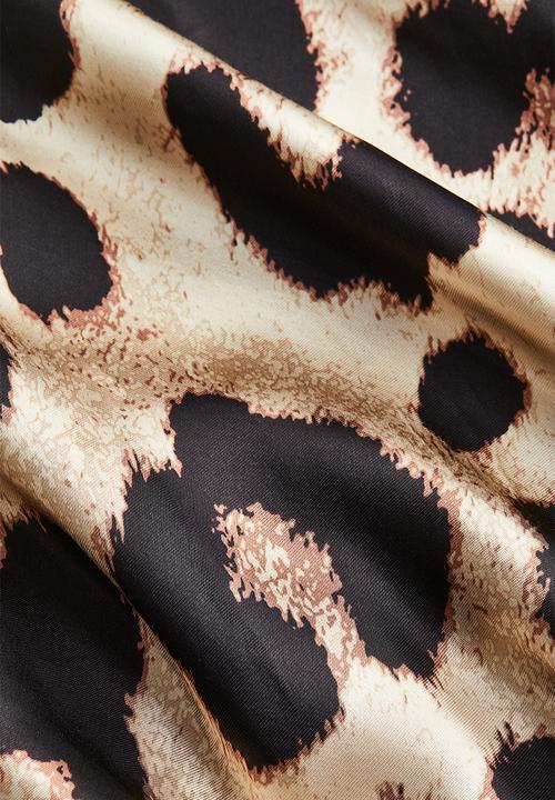 H&M - Flared skirt - light beige/leopard print 