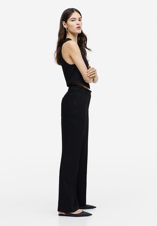 H&M - Straight trousers - black