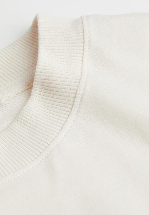 H&M - Oversized printed t-shirt - cream / long beach 