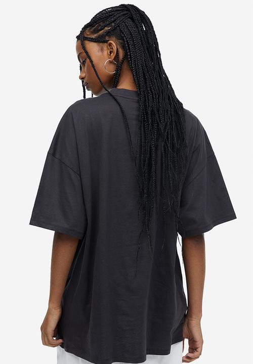 H&M - Oversized printed t-shirt - black / supernova 