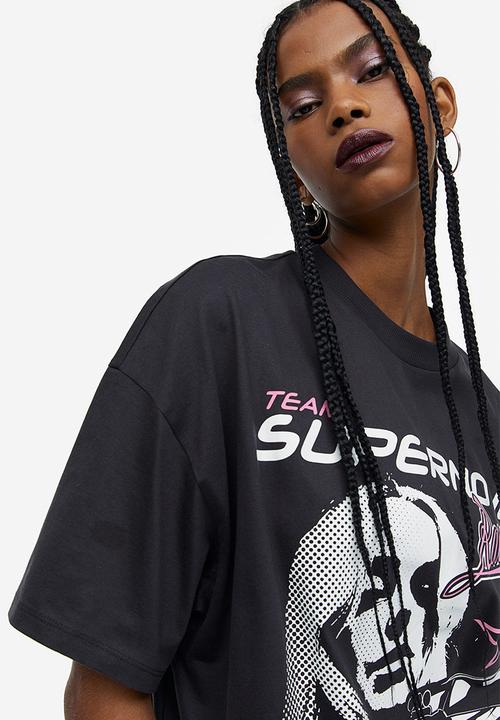 H&M - Oversized printed t-shirt - black / supernova 