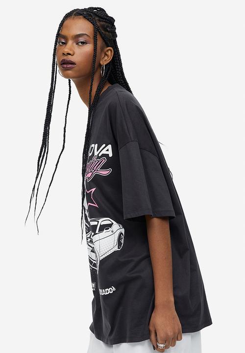 H&M - Oversized printed t-shirt - black / supernova 