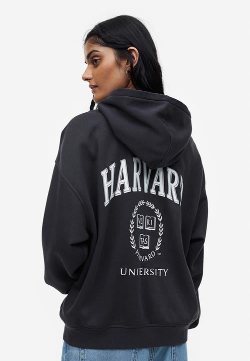 H&M - Oversized printed hoodie - black / harvard