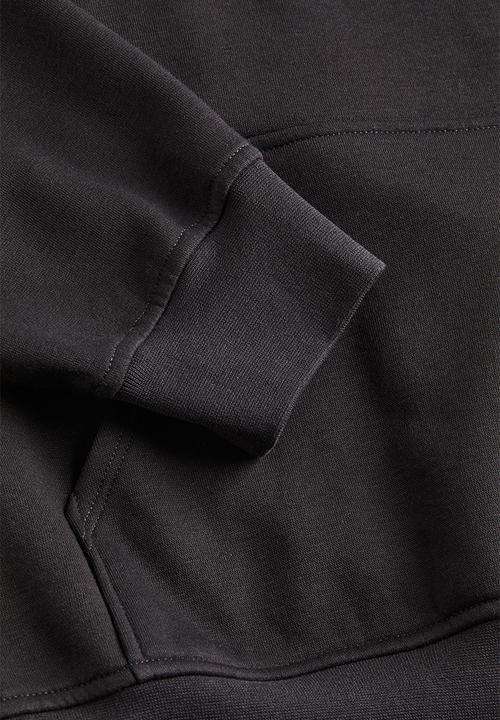H&M - Oversized printed hoodie - black / harvard