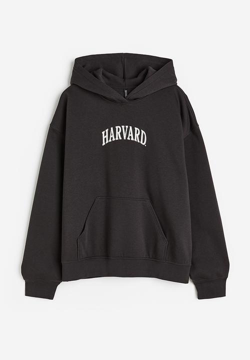 H&M - Oversized printed hoodie - black / harvard