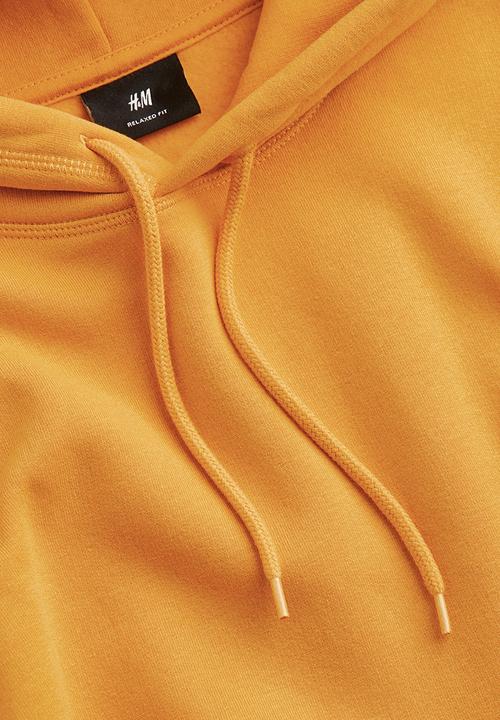 H&M - Relaxed fit hoodie - dark yellow