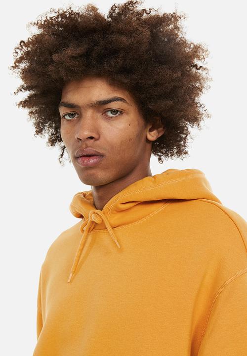 H&M - Relaxed fit hoodie - dark yellow