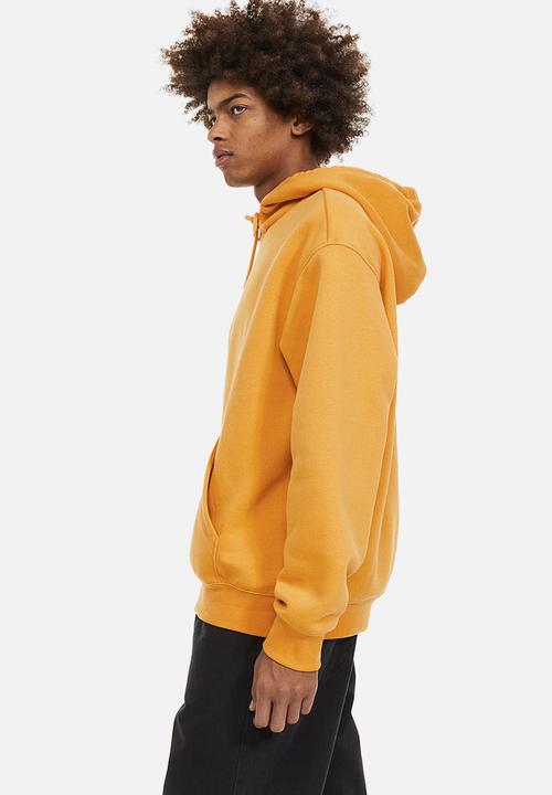 H&M - Relaxed fit hoodie - dark yellow