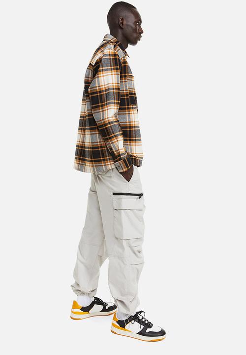 H&M - Relaxed fit zip-through overshirt - orange & black checked