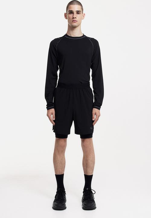 H&M - Drymove™ double-layered sports shorts - black