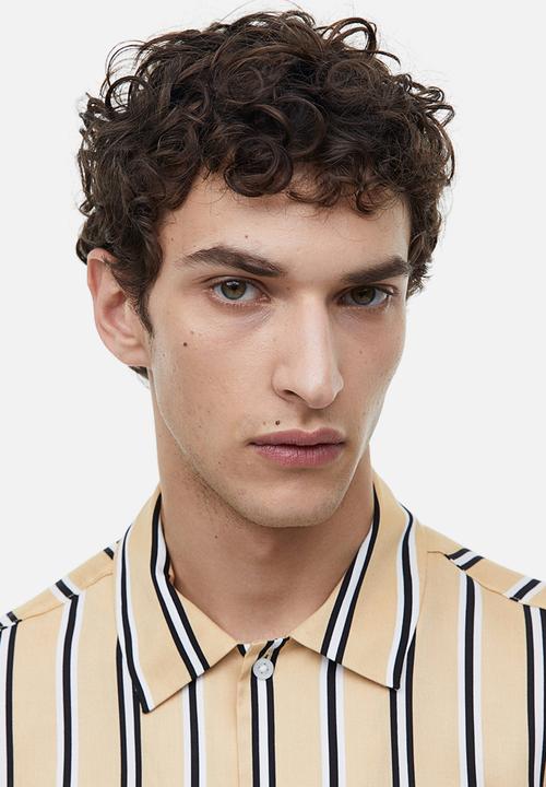 H&M - Regular fit short-sleeved lyocell shirt - beige