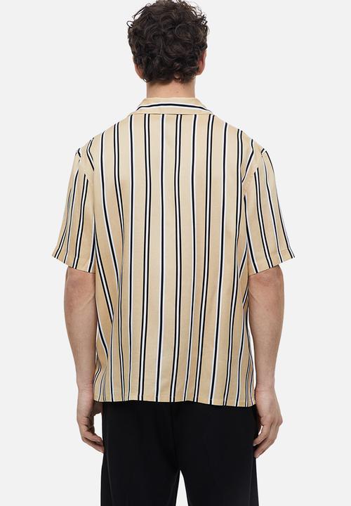 H&M - Regular fit short-sleeved lyocell shirt - beige