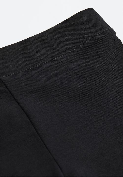 H&M - Leggings - black & magical team 