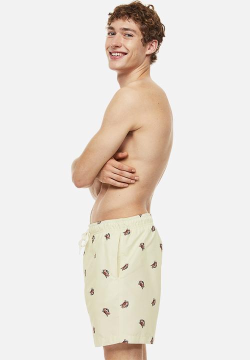 H&M - Patterned swim shorts - light yellow crabs 