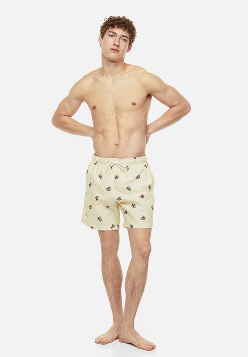 H&M - Patterned swim shorts - light yellow crabs 