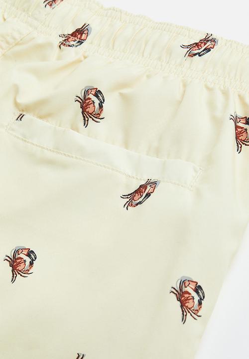 H&M - Patterned swim shorts - light yellow crabs 
