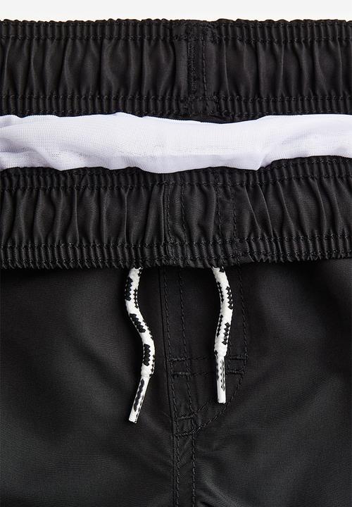 H&M - Swim shorts - black & surf vibes 